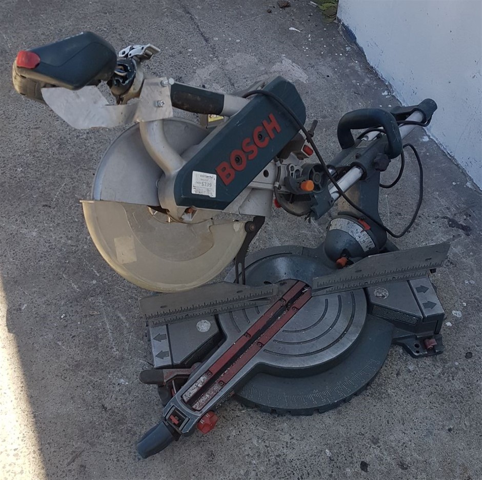 BOSCH DROP SAW 60 DEGREE ANGLES 240V POWER PLUG IN BROKE HANDLE Located
