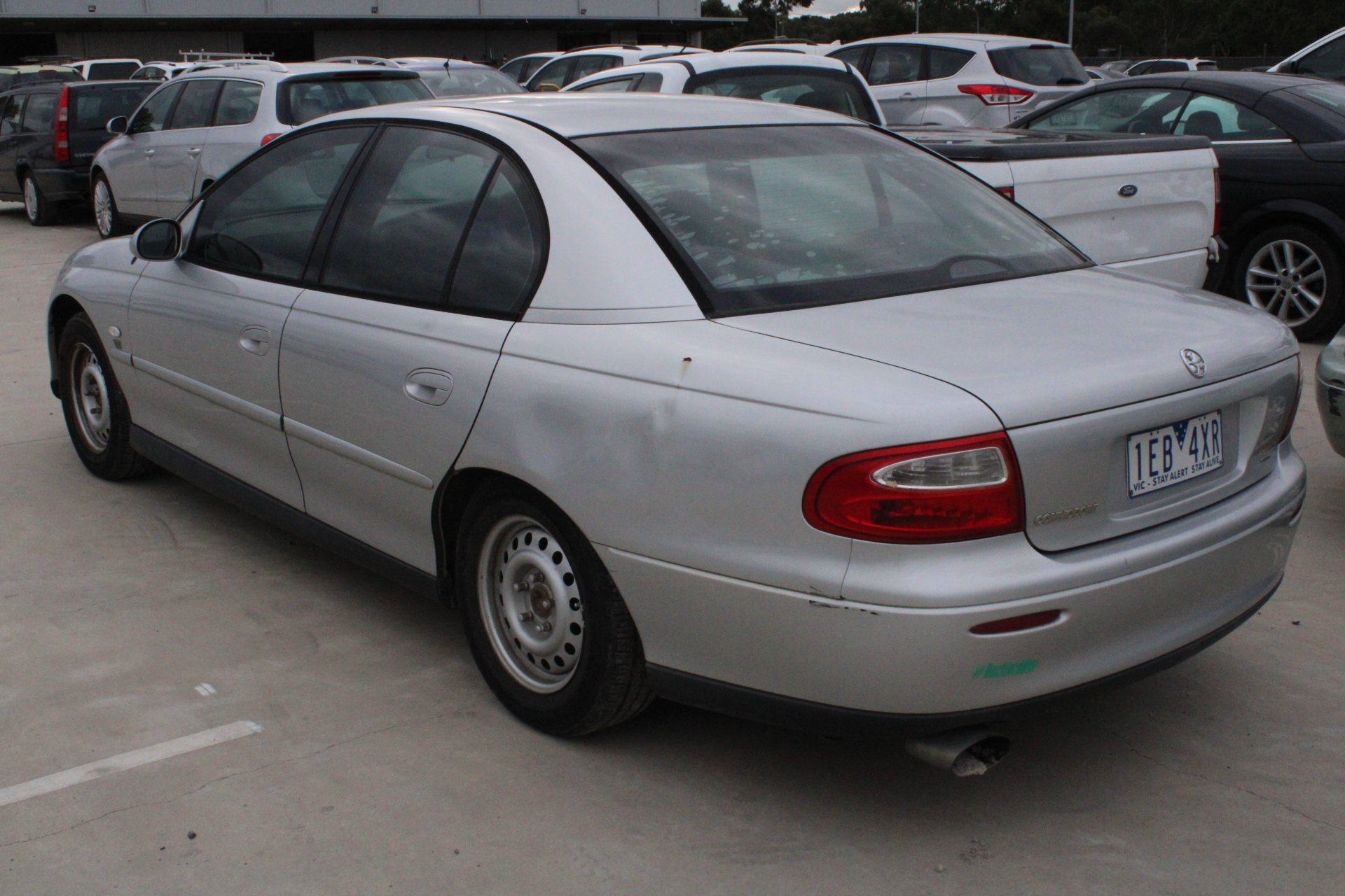 Designer Simulated Diamond Large Orange Teardrop Pendant in Silver