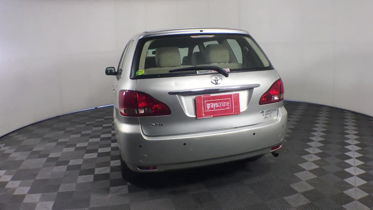 Designer Simulated Diamond Teardrop Earrings in Gold