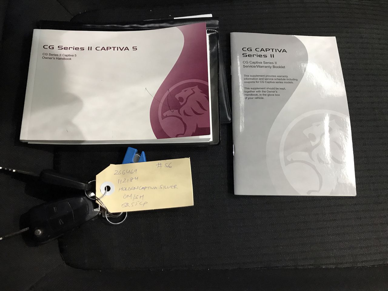 Designer Simulated Diamond Round Black Drop Earrings in Gold