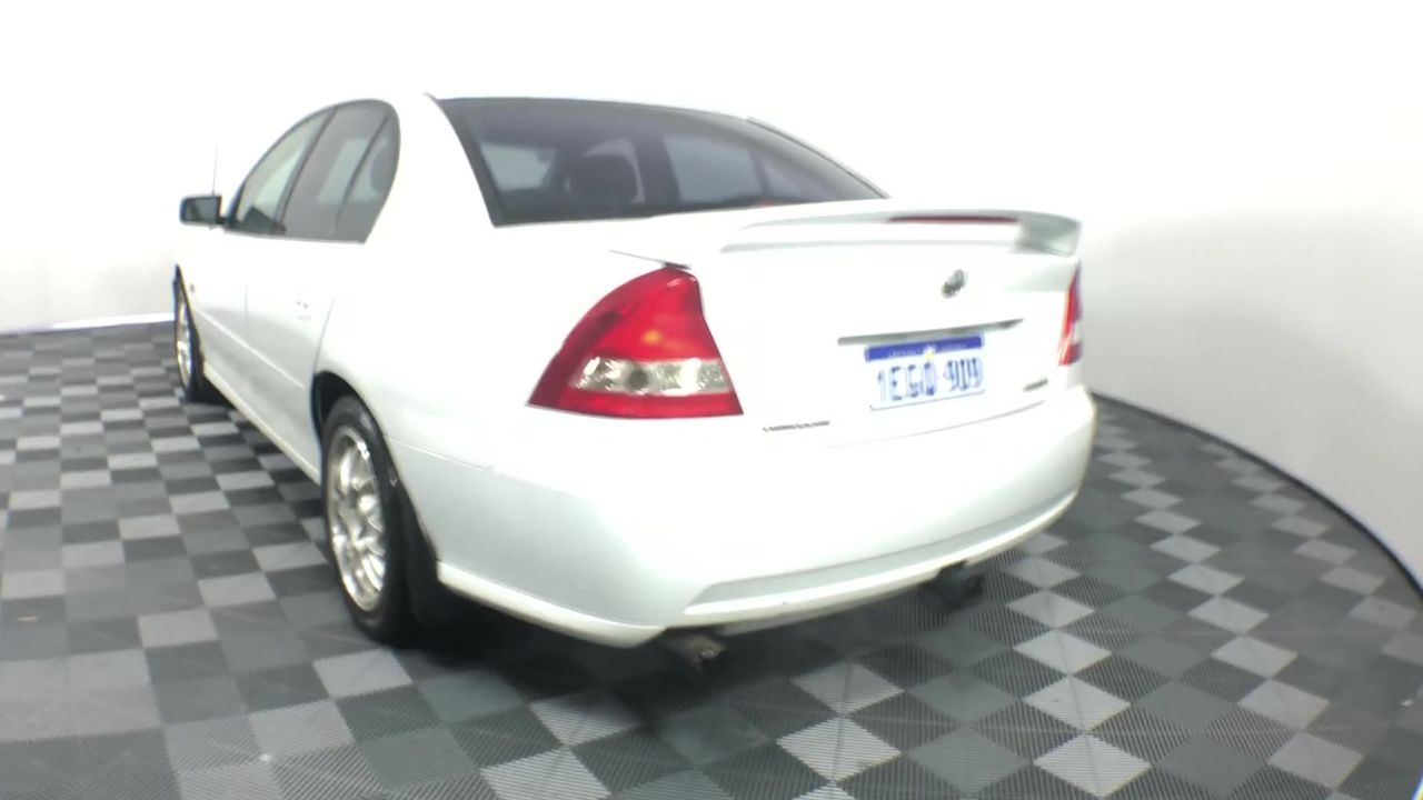 MIRACLESUIT Women's Helix Swimsuit, Size US16, Black/White.  Buyers Note -