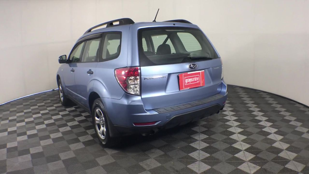 Designer Simulated Diamond Ball Bracelet with Braided Brown Band