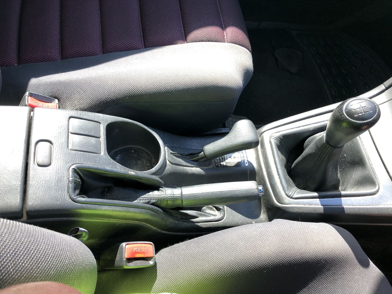 Used Cushioned Arm Chair