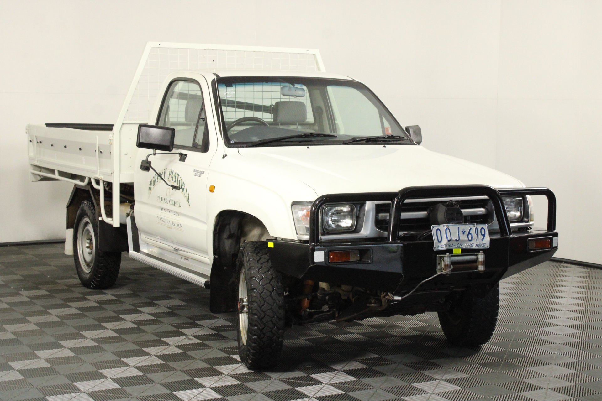 1999 maroon toyota hilux 4x4 pickup