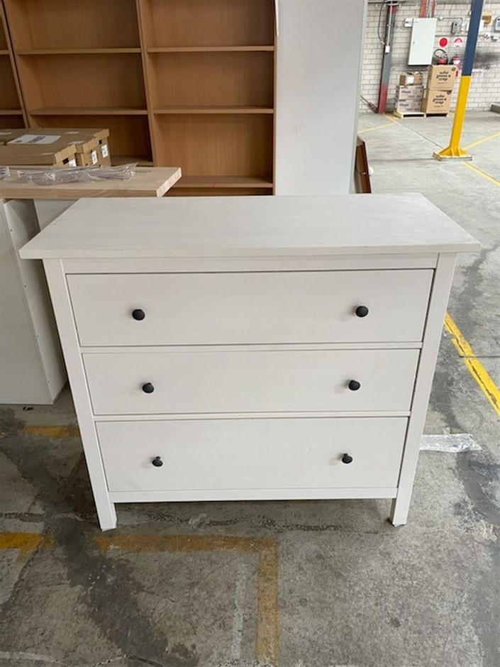 Chest of drawers painted white with black round metal handles. Auction (00075044006) Grays