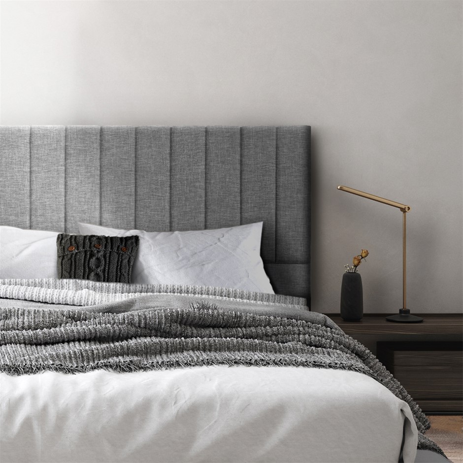 Grey material bed deals head