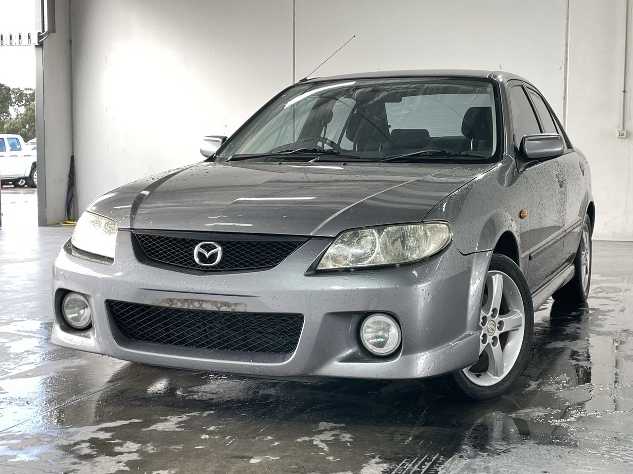 2003 Mazda 323 Protege SP20 BJ Automatic Sedan Auction (000120053823) Grays Australia