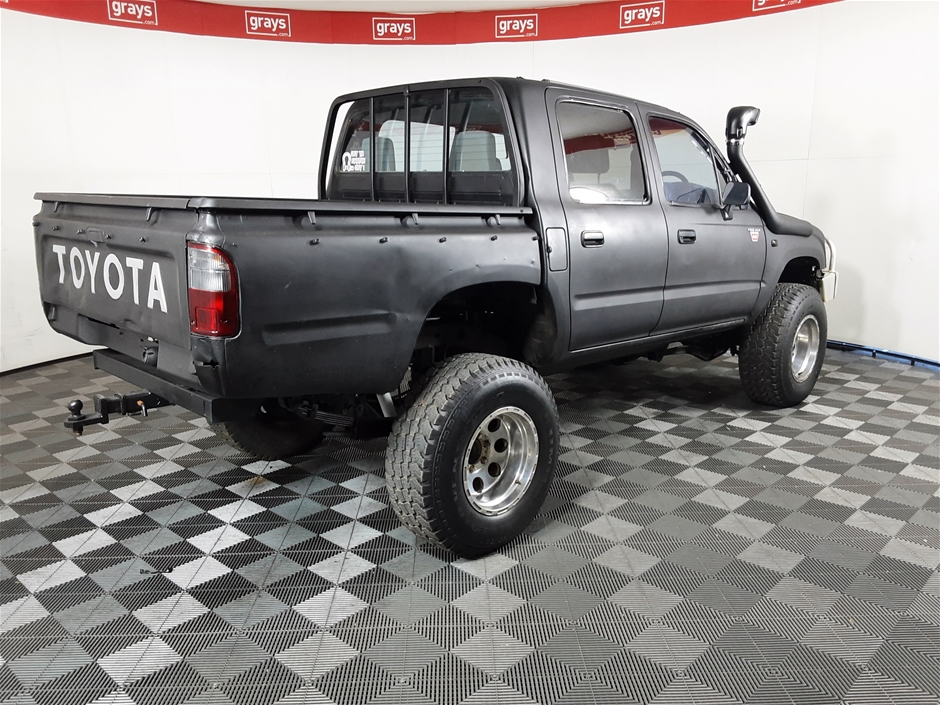 1999 maroon toyota hilux 4x4 pickup