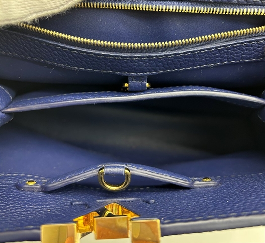 A Louis Vuitton 'Very' Blue Leather Tote Bag. Python tri…
