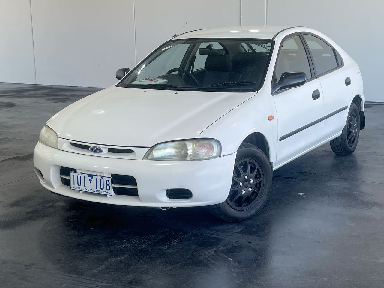 1994 Ford Laser LXi LIATA KJ Manual Hatchback