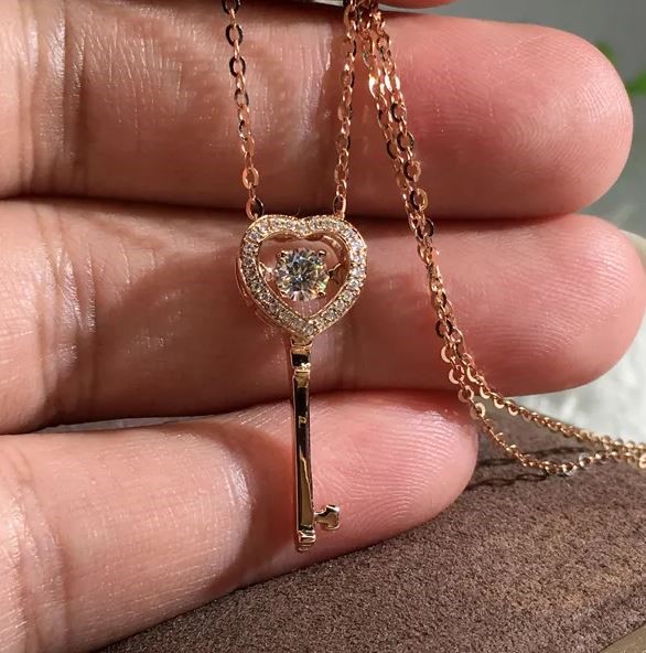 Elegant 18K Rose Gold plated Key Simulated Diamond & White CZ Pendant