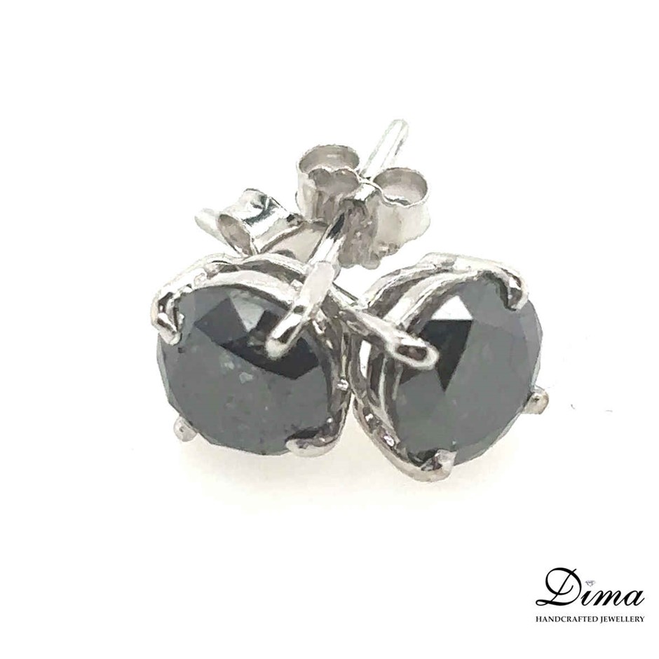 One pair of ladies - 9ct White gold stud earrings