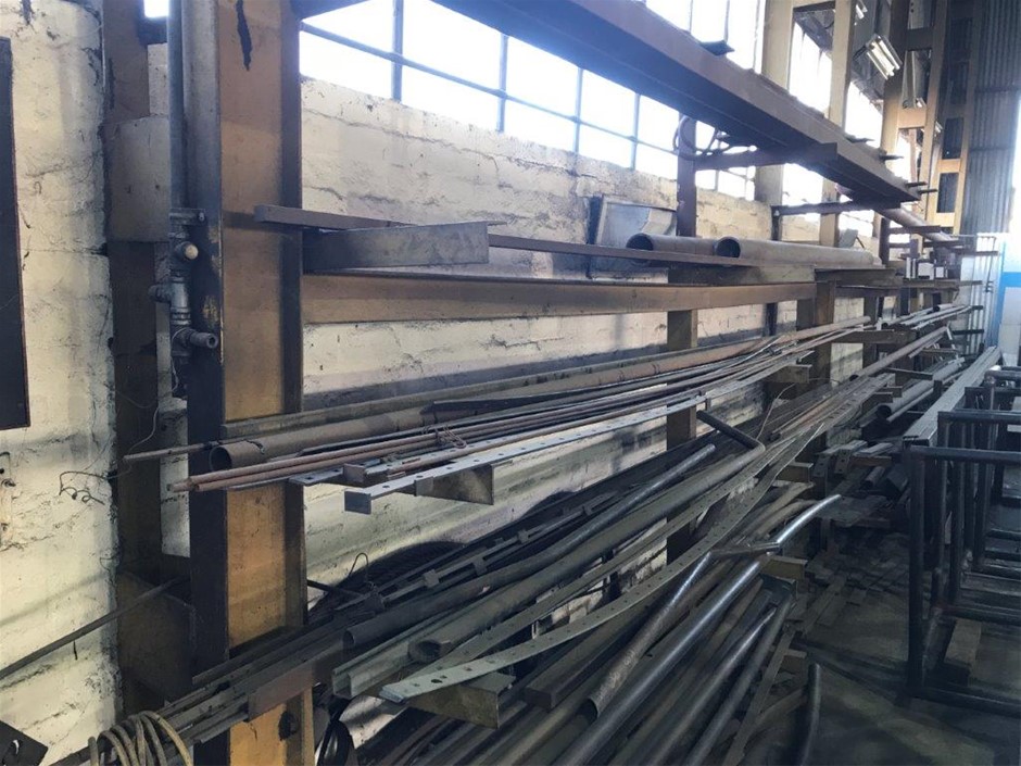 Large Quantity of Assorted Length of Steel in Wall Mounted Stock Rack ...