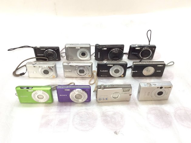 Assorted Cameras and Camera Accessories