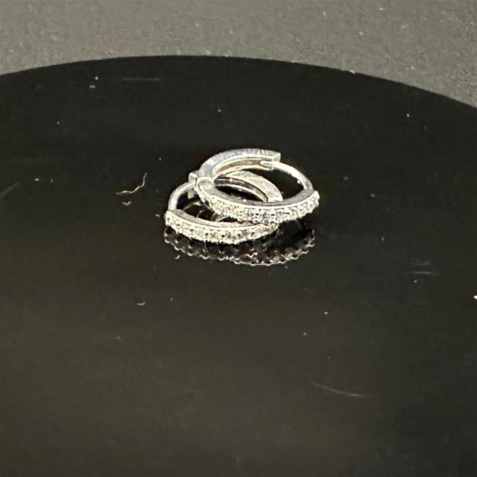 Designer Simulated Diamond Round Earrings in Silver