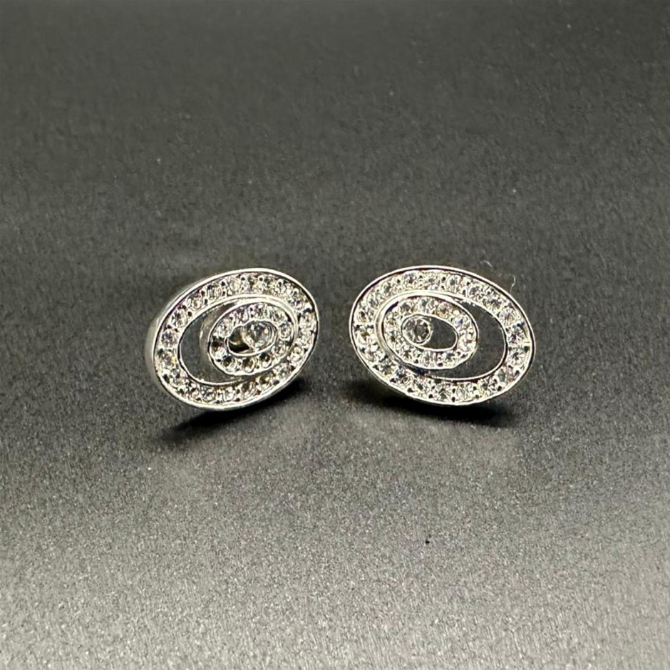 Designer Simulated Diamond Oval Earrings in Silver