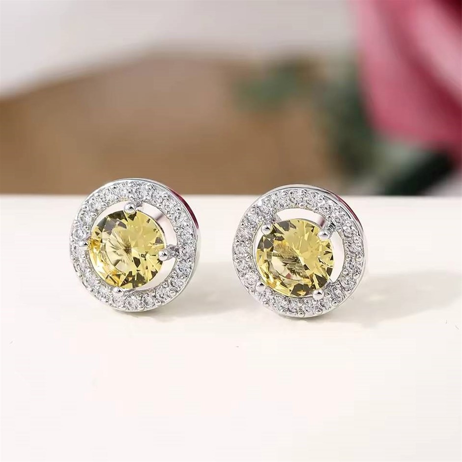 Designer Simulated Diamond Yellow Round Stud Earrings in Silver