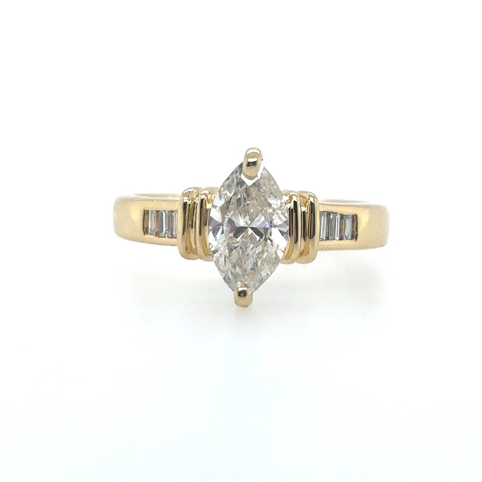 1.01ct Marquise Dia. G/P1 & 0.15ct Six Stones Baguette Dia. G/VS Ring 18K