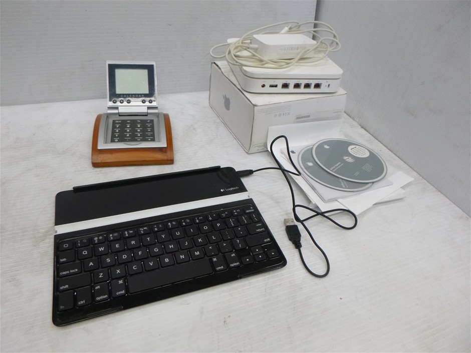 Box of Assorted Items including Apple Base Station, Logitech Keyboard