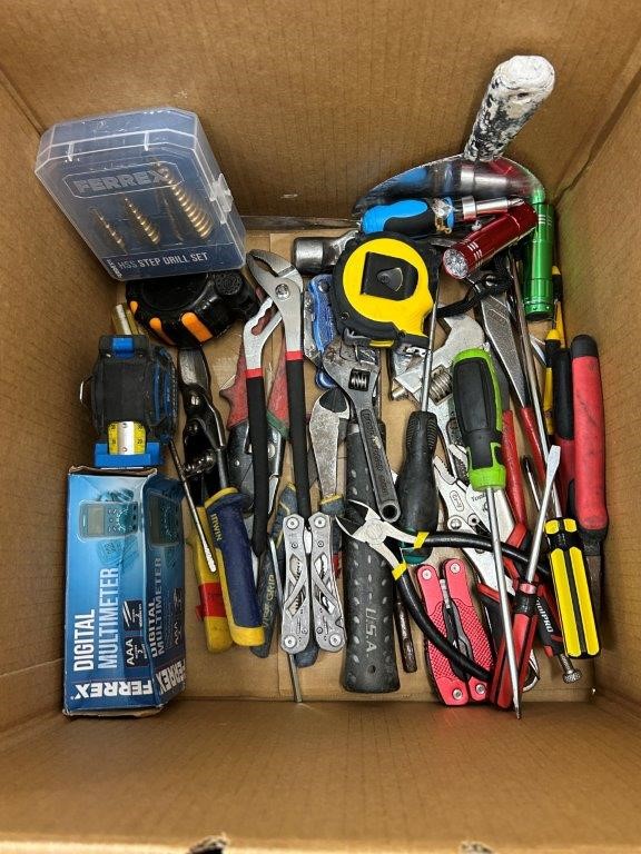 Assorted hand tools to box