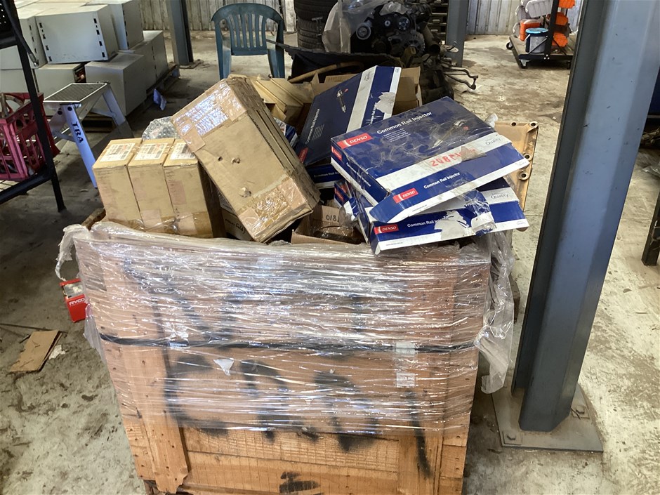 Crate Containing Various Auto Parts