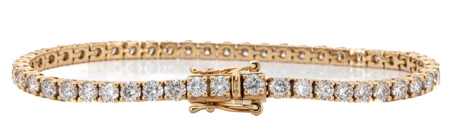 6.04 Carats 18k yellow gold diamond tennis bracelet with a box