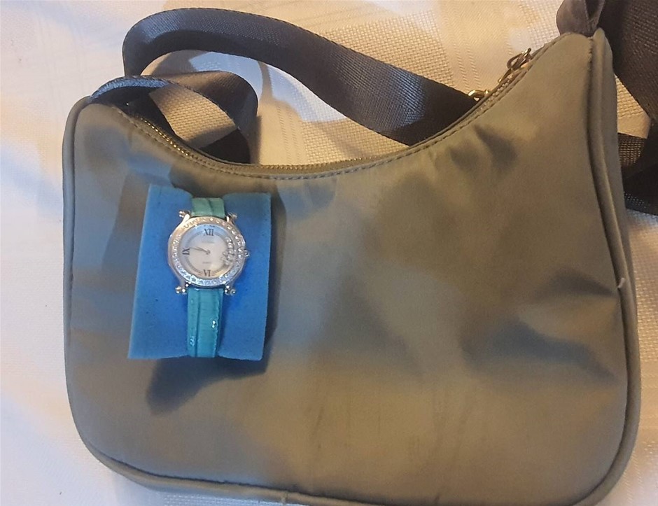 le Chateu Swarovski Stones & Rhodium plated Quarts and a Handbag. New