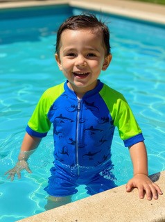 All In One Made With Water Reactive Fabric Showing Dolphin Print When Wet