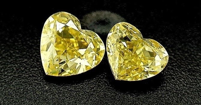0.52 & 0.55 Carat Fancy Intense yellow diamond GIA graded Diamond-very high