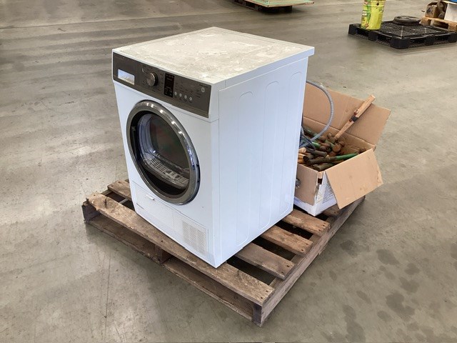 <p>Pallet Containing Front Load Washing Machine And Boxes Of Hammers</p>