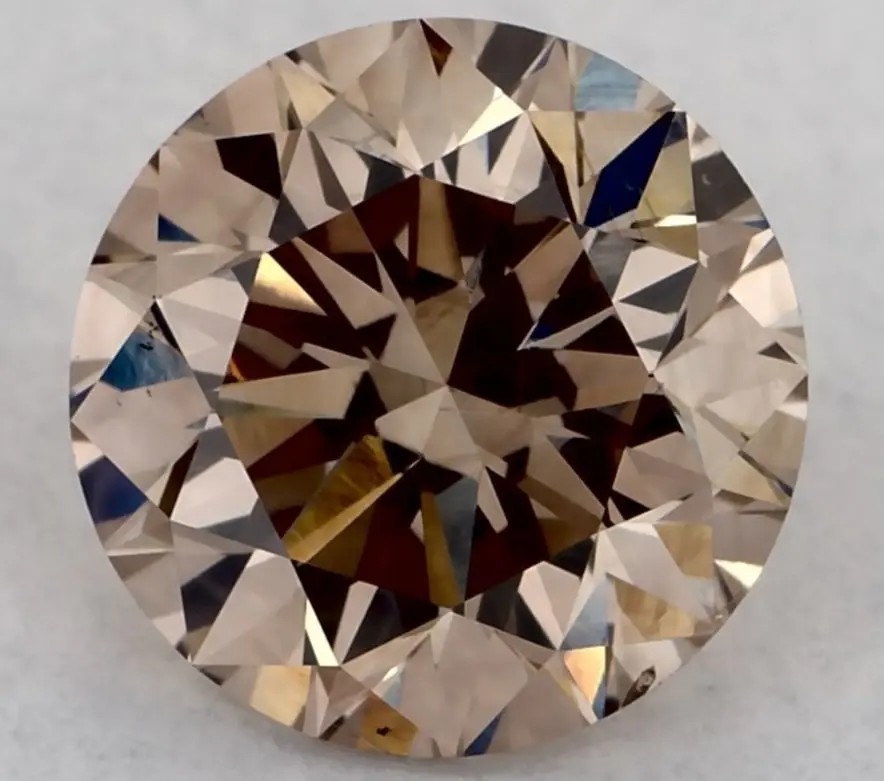 0.54 carat round c6-brown diamond val: $2,862