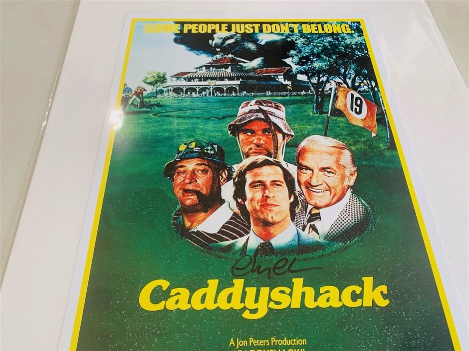 Chevy Chase signed Caddyshack 
poster.