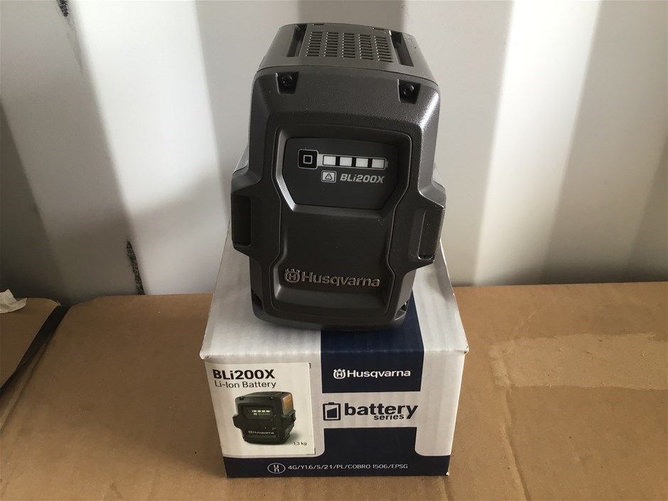 <p>Husqvarna Charger and Batteries</p>