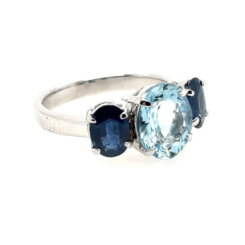 2.45ct an oval cut Aquamarine & 1.88ct 2 oval cut Blue Sapphire Ring 18K