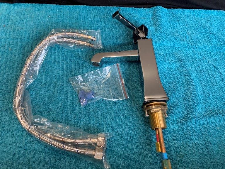 New in Box Simply Inspiring Swivel Basin Mixer Tap - Qty 1