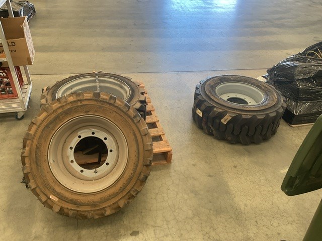 <p>Assorted Boom Lift Tyres On 9 Stud Rims x 3</p>