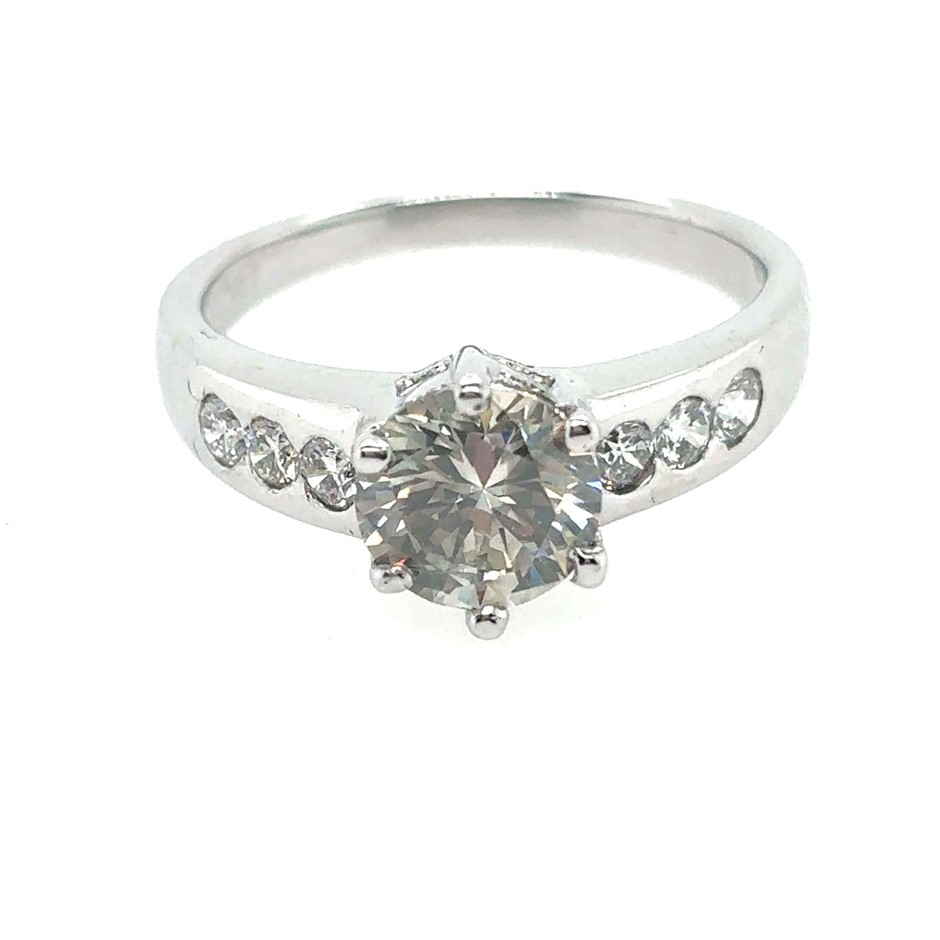1.11ct Dia. SI1 Light Brown & 0.25ct 6 Ring 18K White Gold