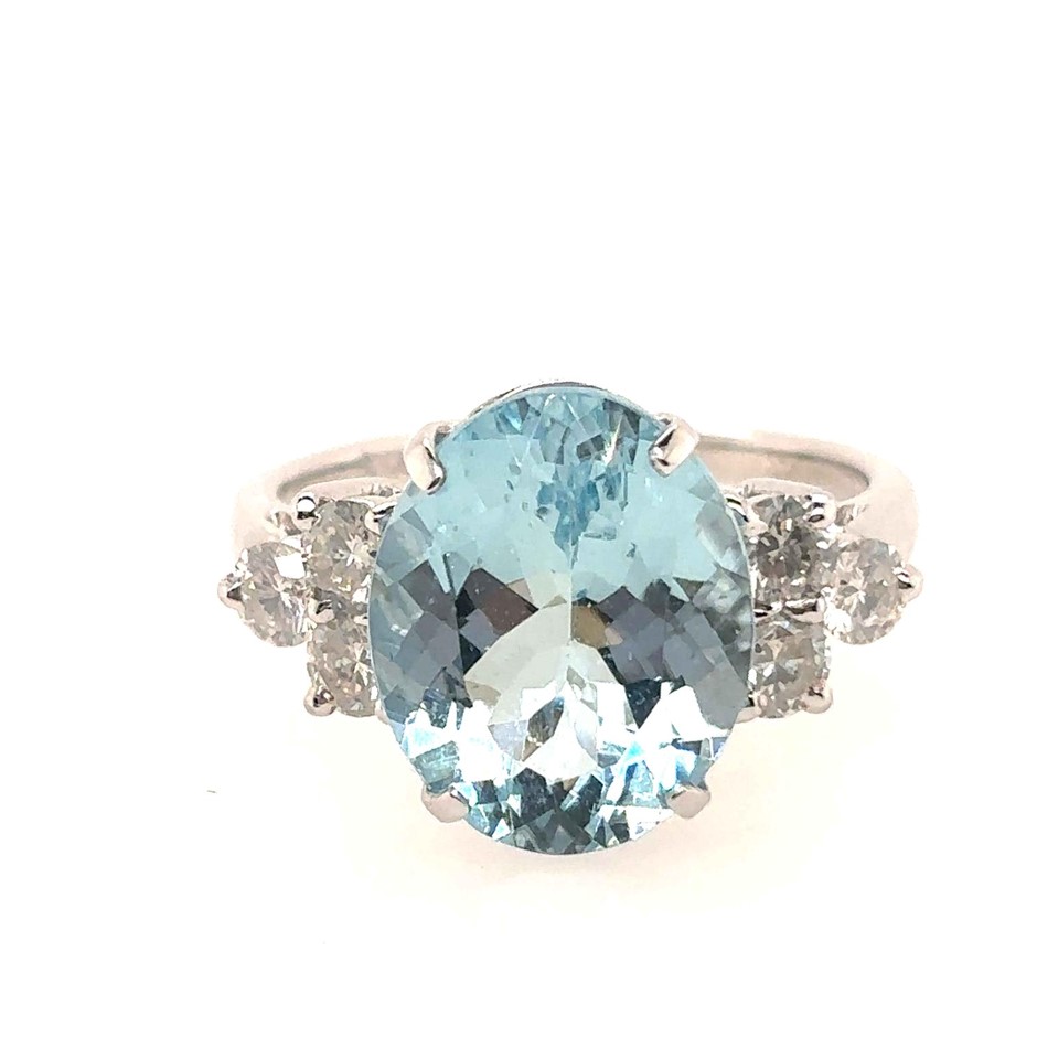 5.75ct an oval cut Aquamarine & 0.75ct 6 Ring 18K White Gold