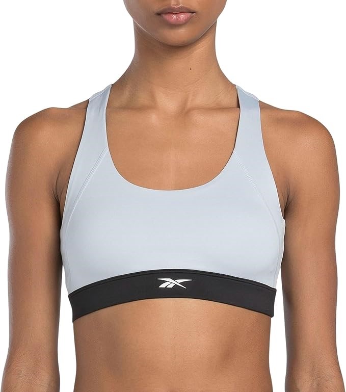 REEBOK Women's ID Train Racer Sports Bra, Pale Blue, Small. Buyers Note -