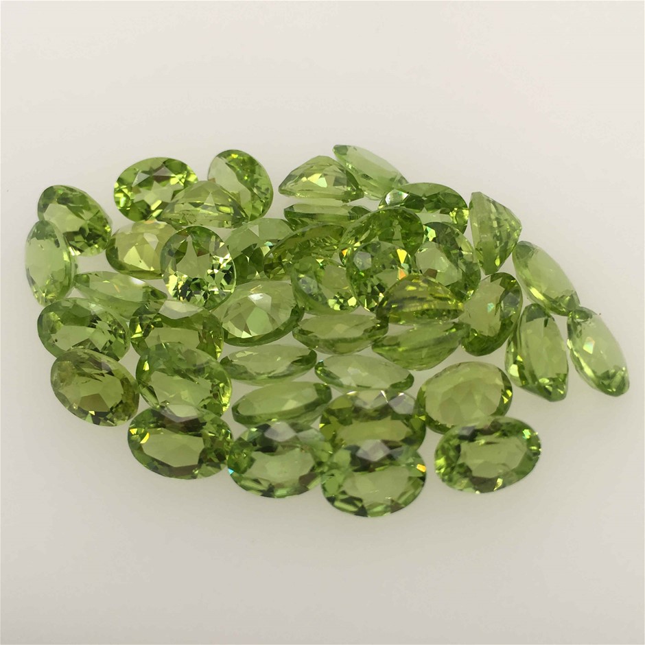Sixty Loose Peridot,  67.22ct in Total