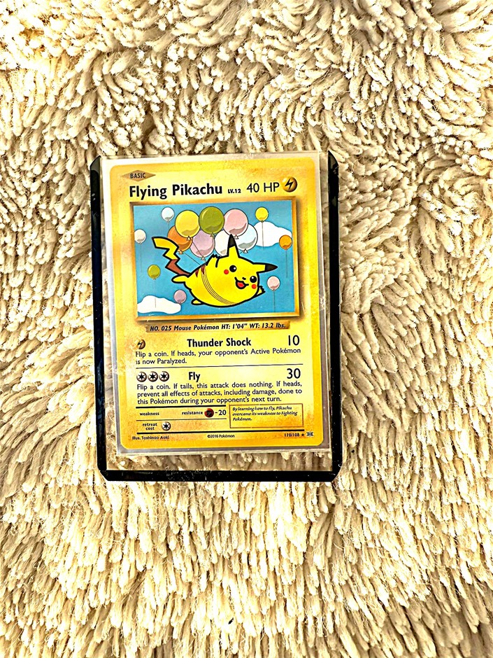 Flying Pikachu classic English promo style card.
