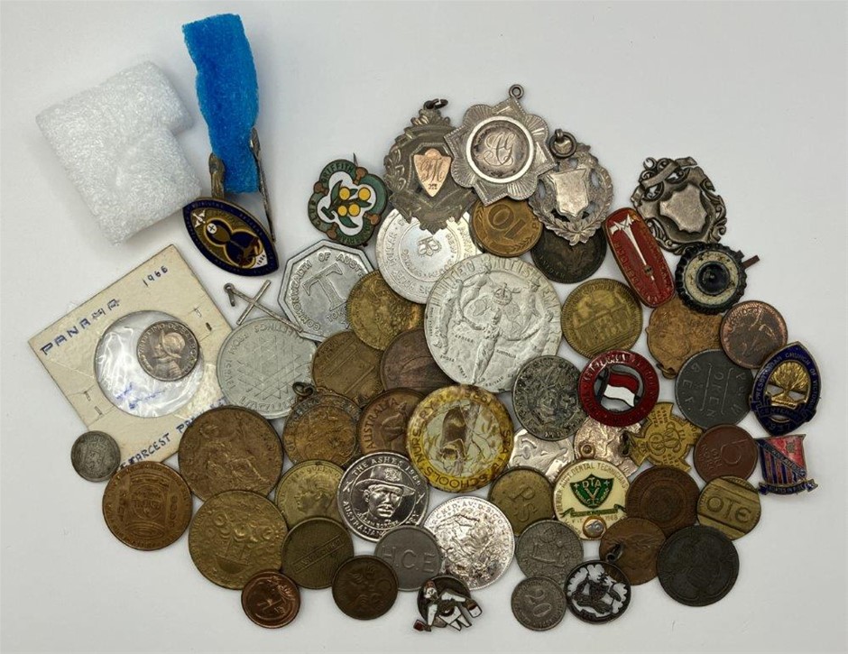 Approx. 57 x Asstd world badges, pins, tokens, coins and  fobs