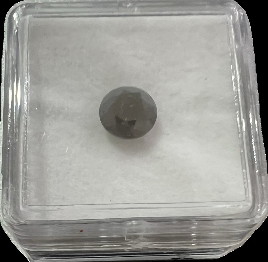 1.19 carat round deep blackish brown natural diamond S12