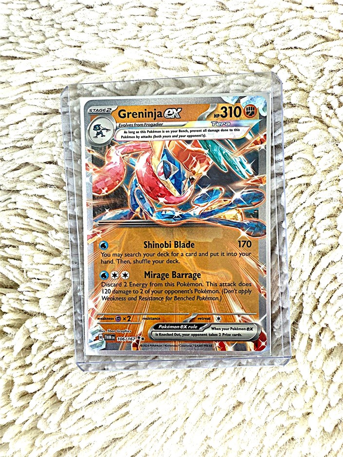 Greninja ex tera crystal-style holographic card.