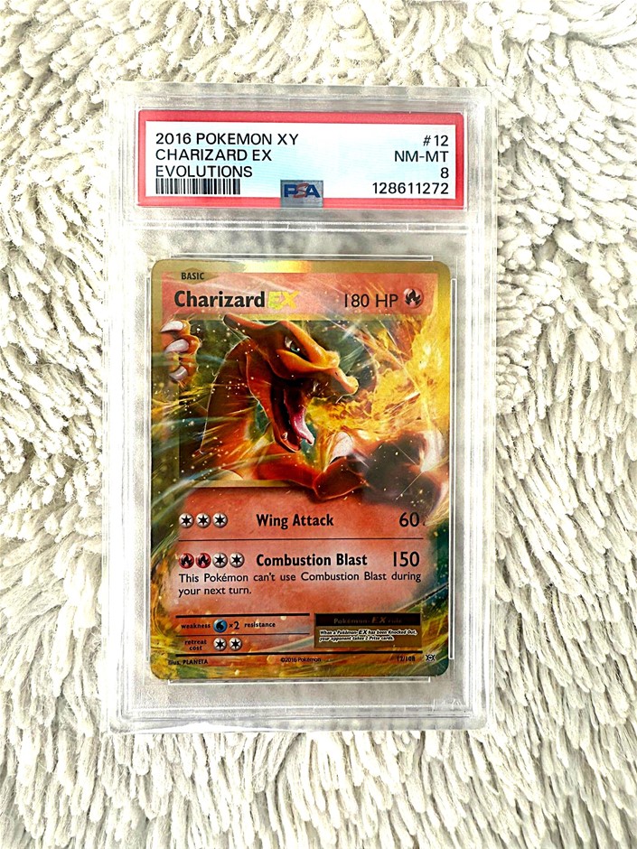 Charizard EX PSA 8 XY Evolutions holo graded slab.
