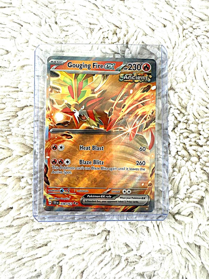 Gouging Fire ex holo ancient paradox fire Pokémon card.