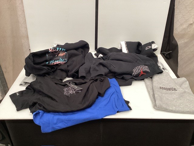 <p>Assorted Clothes </p>