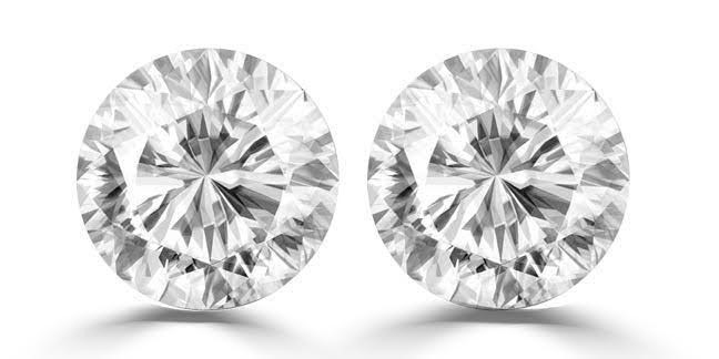0.06 carat 2 round white diamond
