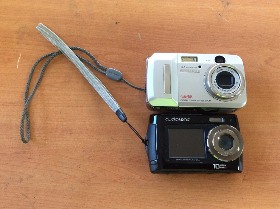 Olympus Zoom Digital Camera + Audiosonic Model Not Visible Digital Camera
