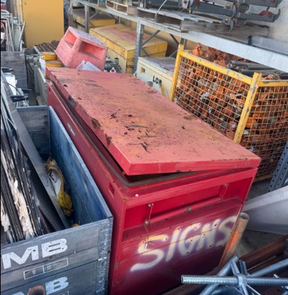 <p>Red Tool Box of Construction Signs</p>